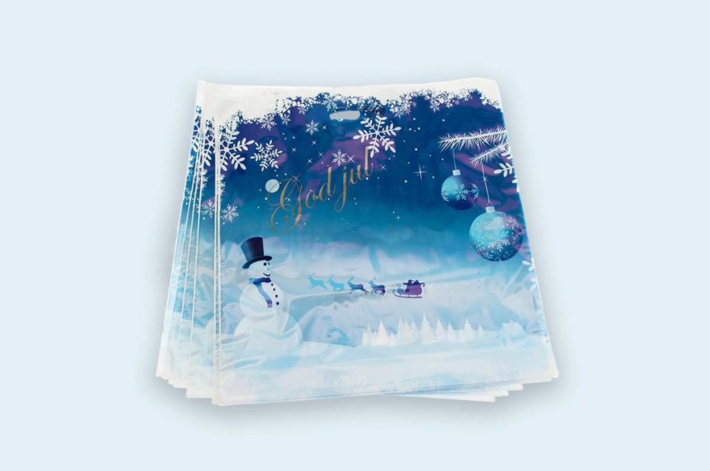 "Julebærepose med festlig trykk, perfekt for gaveinnpakning og høytider. Designet for å bringe glede til gaveutdelingen."